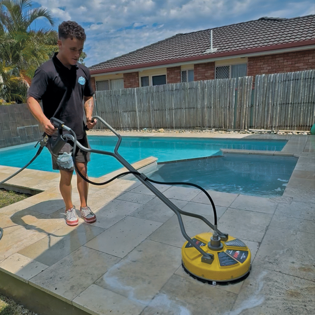 Pressure washing a concrete surface using a circular surface cleaner attachment